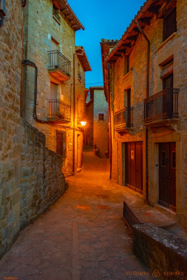 as it is here/now tollifson sunrise medieval street spanish village